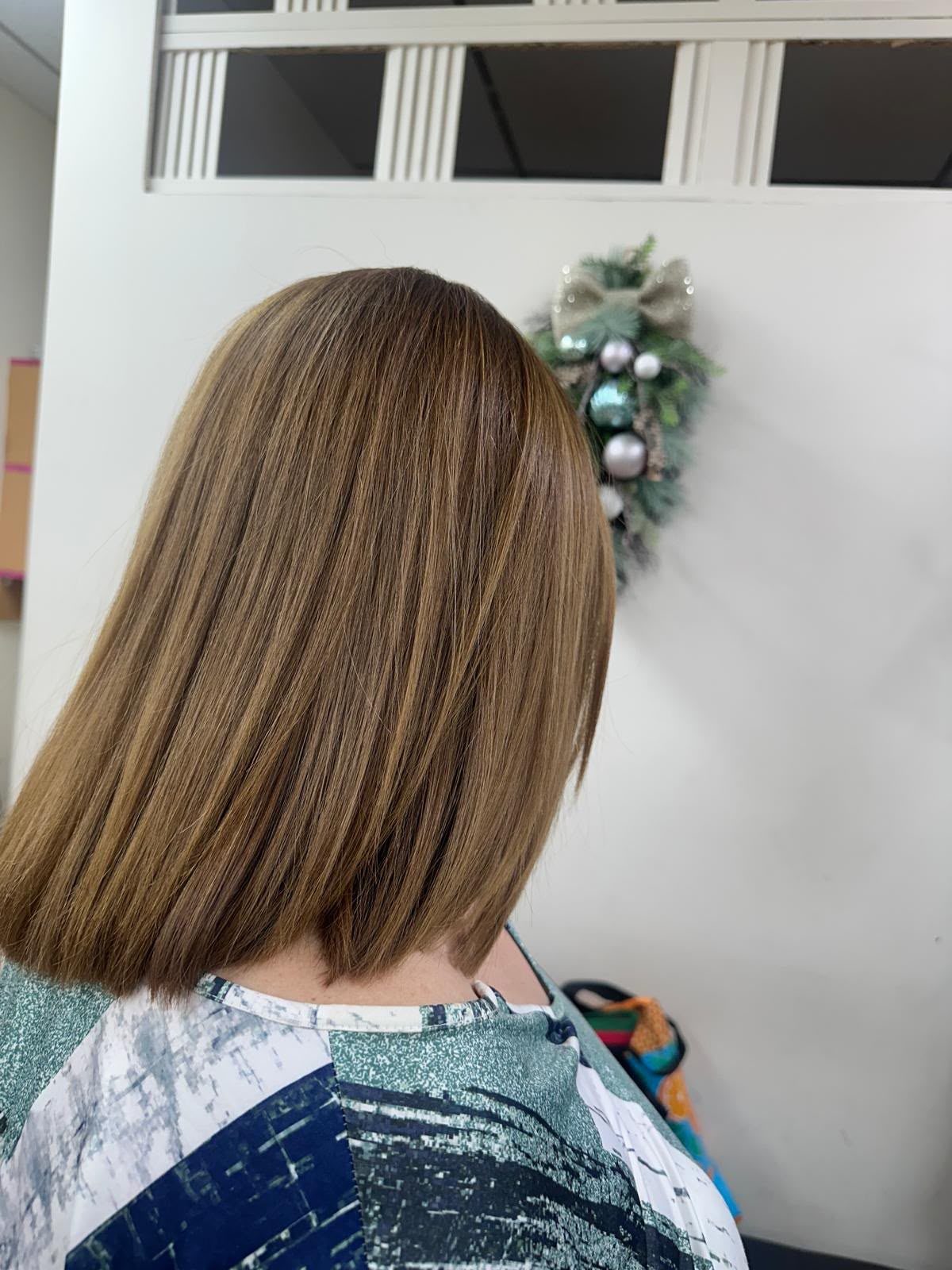 Balayage highlights and sleek blowout result at Martha's Unisex Beauty Studio