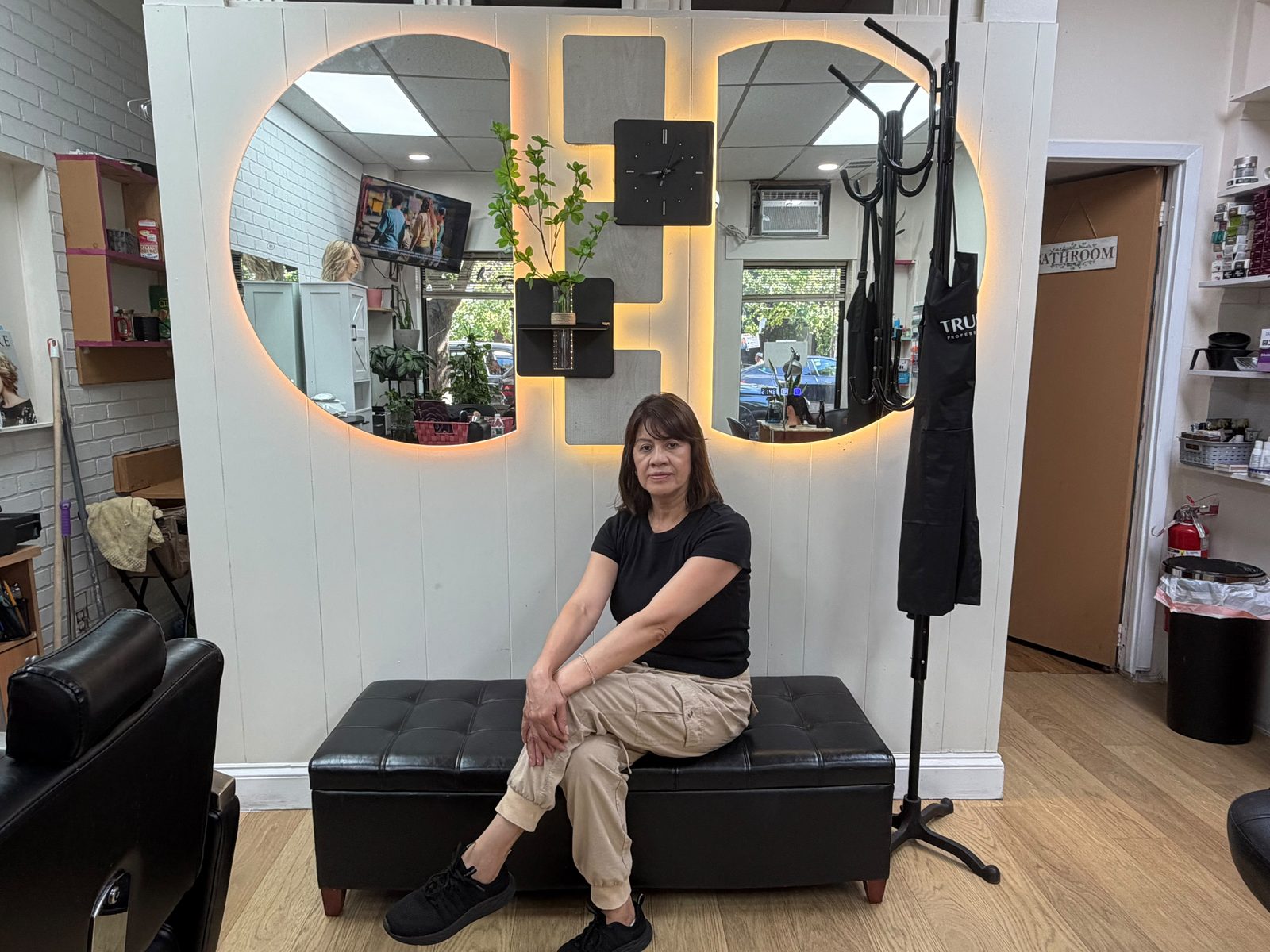 Martha Cabrera, founder and master stylist, inside Martha's Unisex Beauty Studio LLC